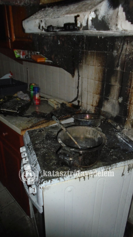 kormozódott, megolvadt tűzhely